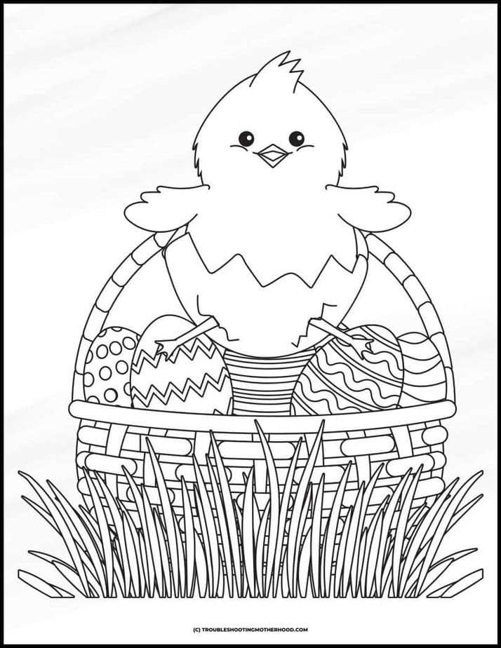 Easter coloring pages for kids, grass, with an Easter basket with decorated eggs and a baby chick popping out of an egg.