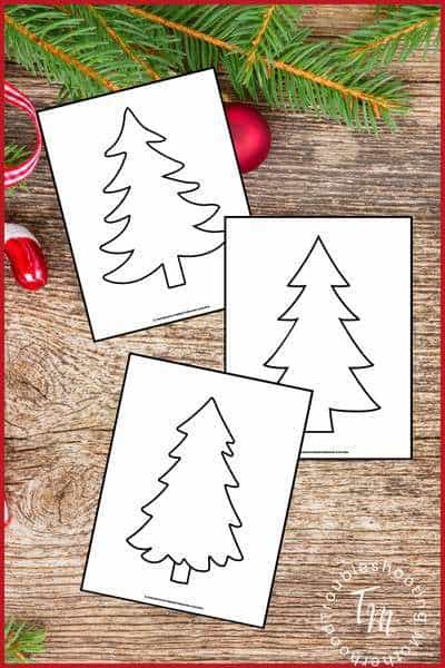 Background wood boards and Christmas garland. 3 images of different Christmas tree outlines.