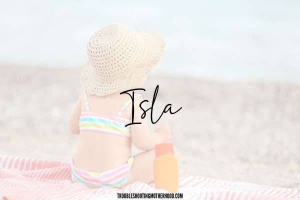 Beachy Names for Girls. Image of baby girl on beach, with the name "Isla" in text. 