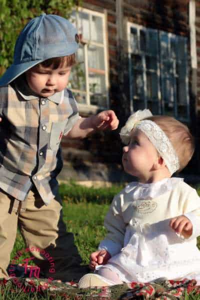 Image of Toddler boy and girl outside on grass. Double Barrel Baby Names List. Unique Double Names.